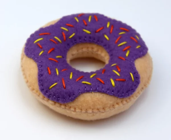 felt toy donut with sprinkles